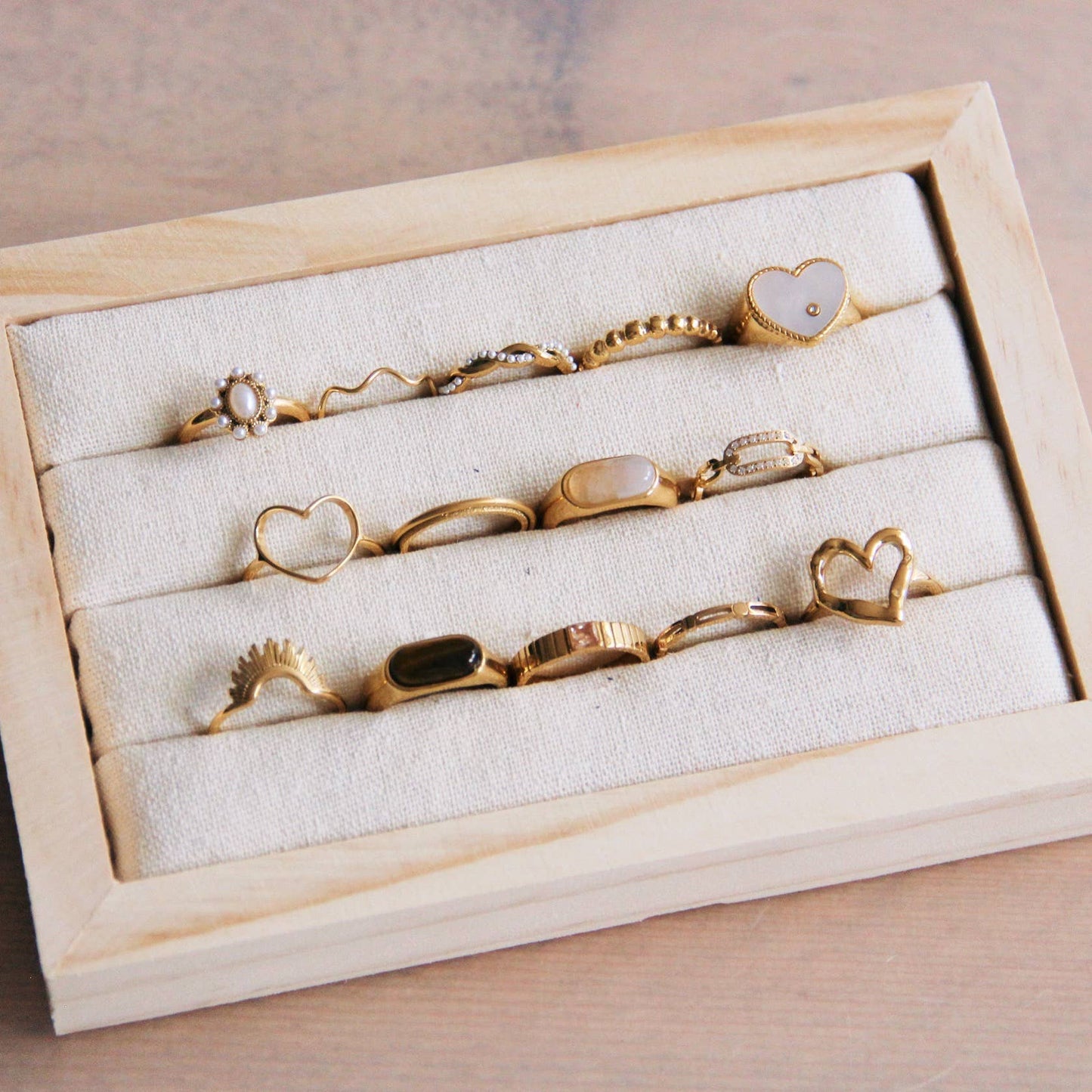 Stainless steel braided ring with pearl rope - gold