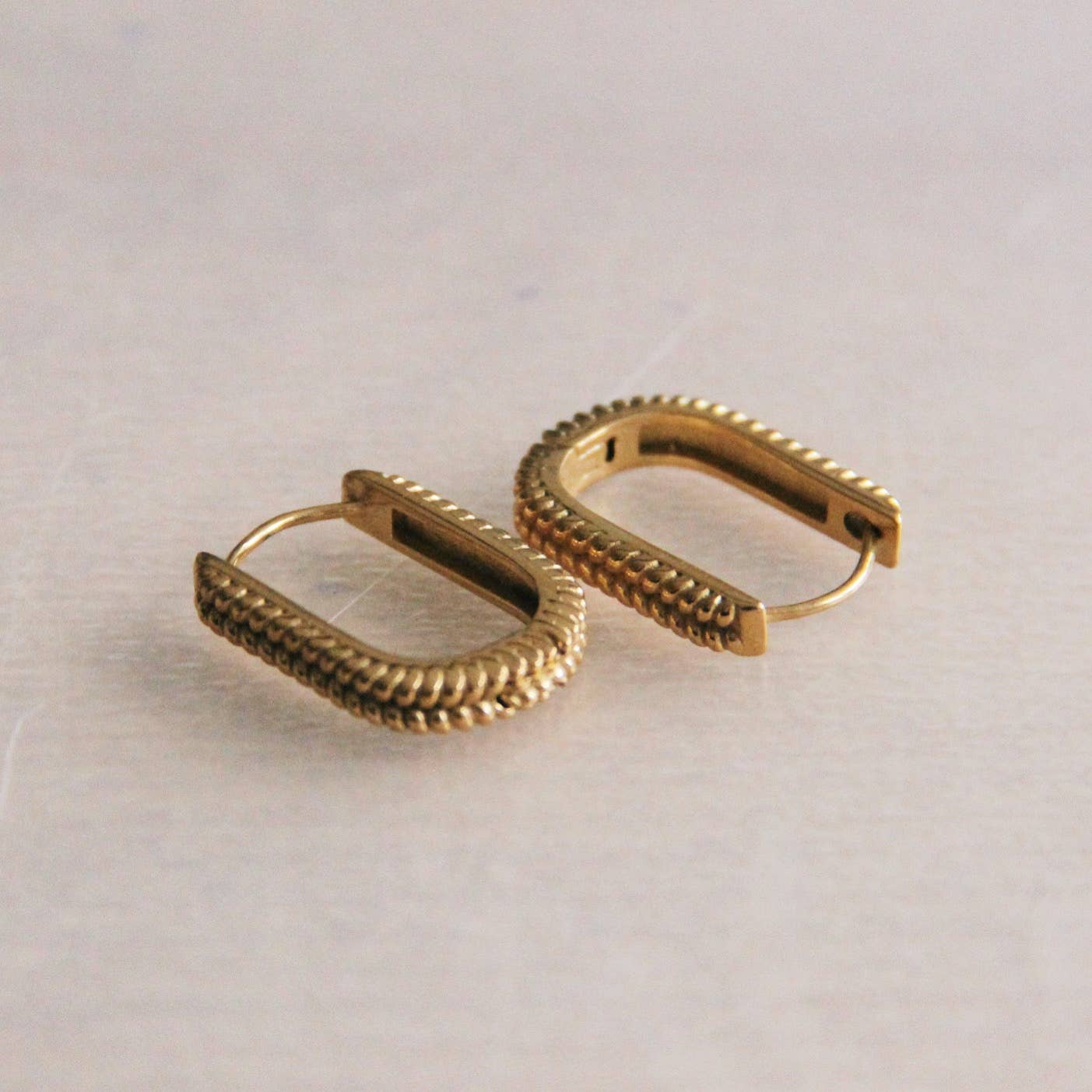 Stainless steel creole oval braided – gold