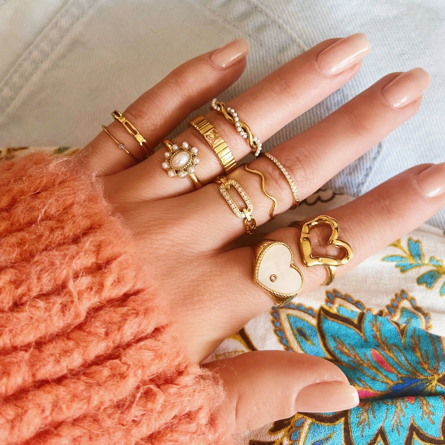 Stainless steel braided ring with pearl rope - gold