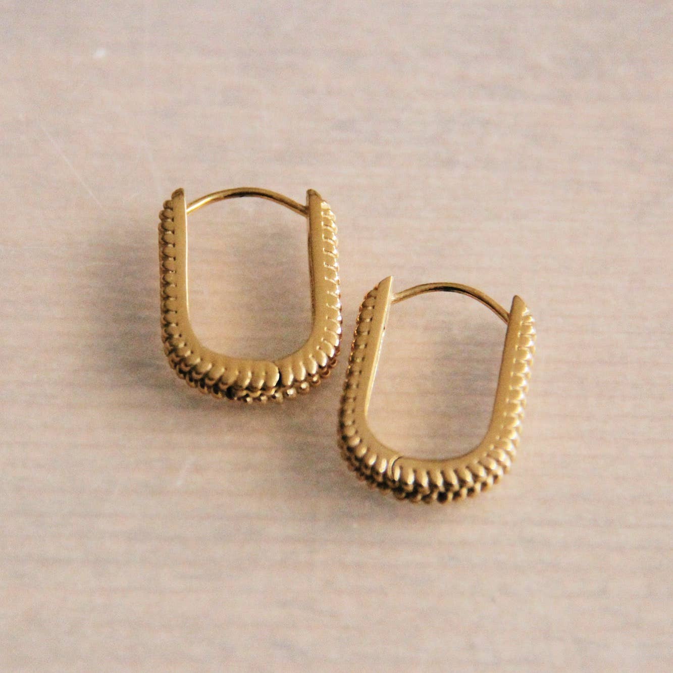 Stainless steel creole oval braided – gold