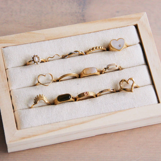 Stainless steel braided ring with pearl rope - gold